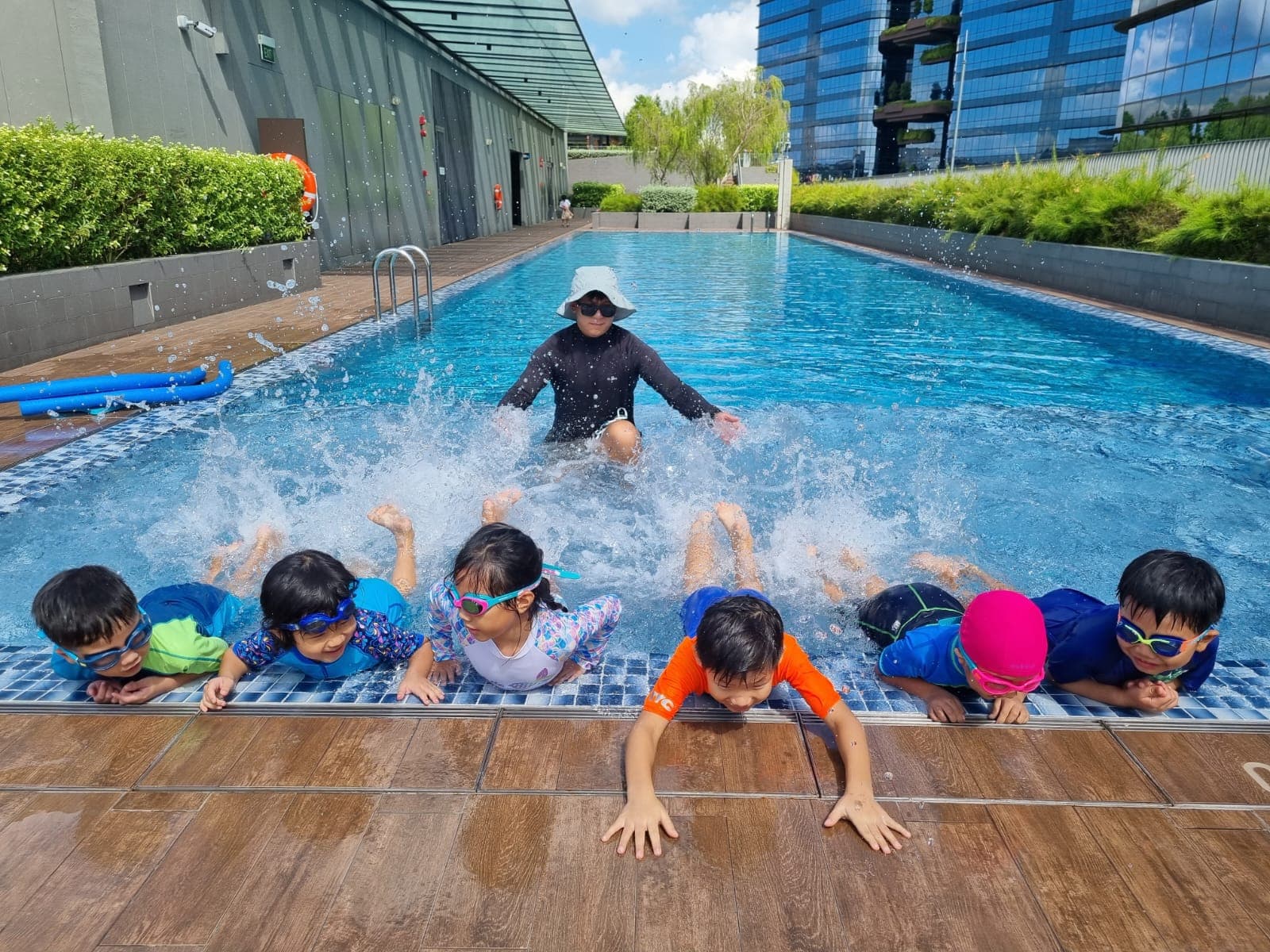 JustSwim coach teaching at a public swimming complex in Singapore
