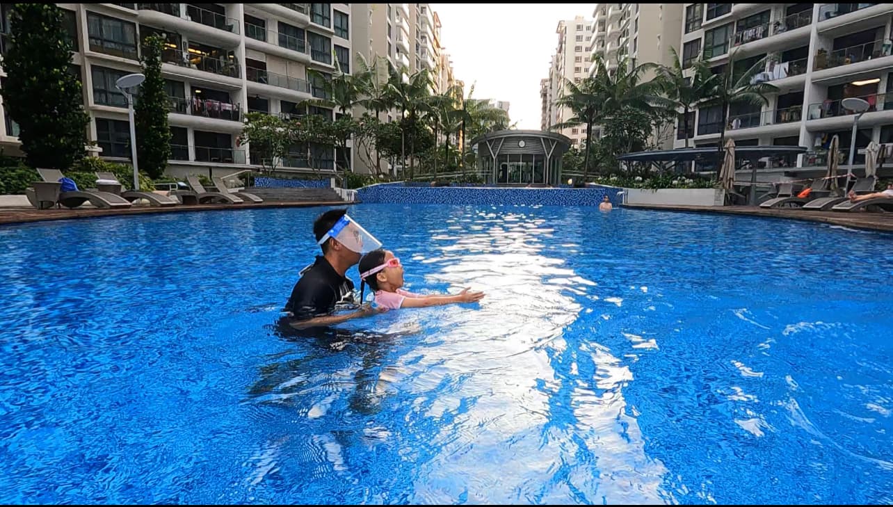 In-water coaching at a condominium pool in Singapore