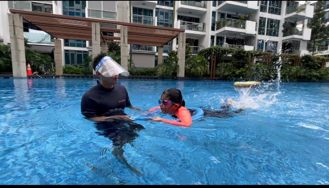 Private swimming lesson at a Singapore condominium pool