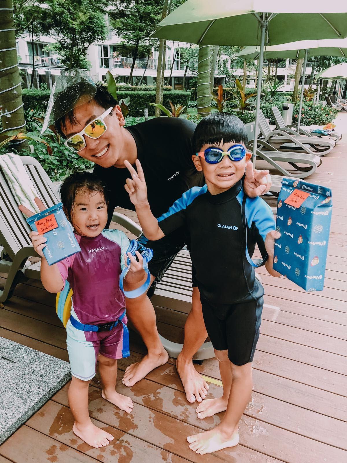 Group of kids at the poolside during a JustSwim class